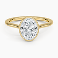 Oval Cut 1.5mm Bezel Ring in 18K Yellow Gold