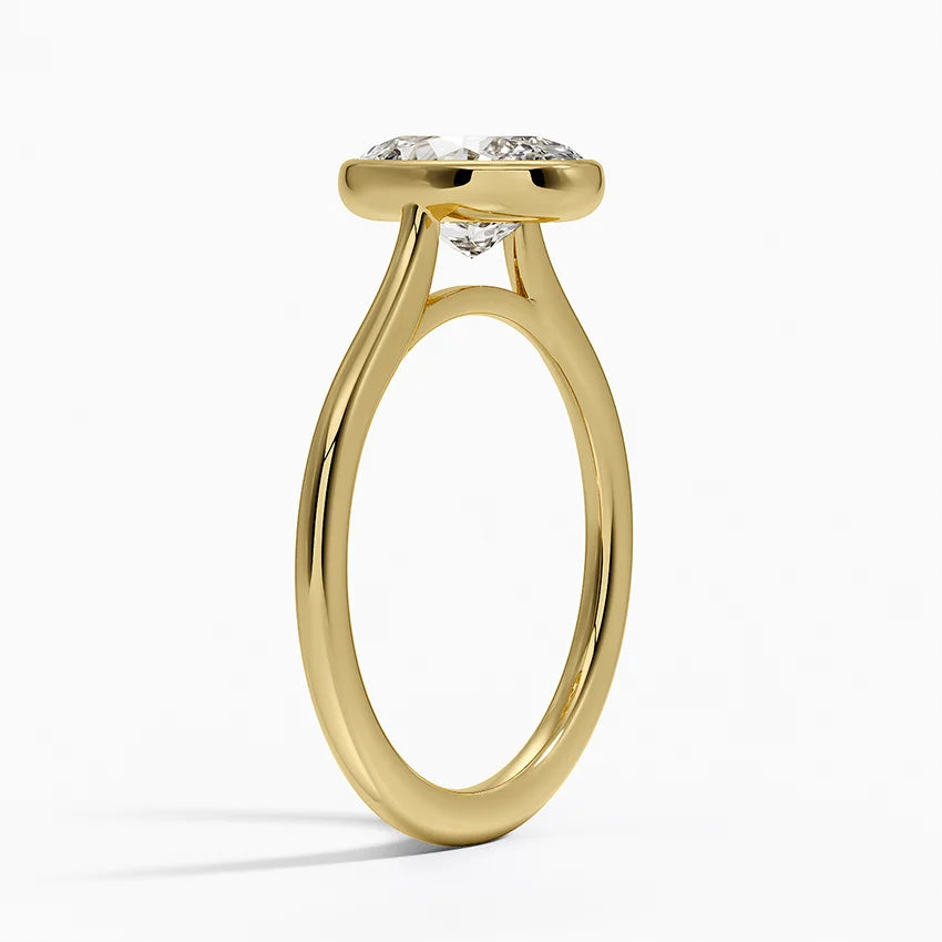 Oval Cut 1.5mm Bezel Ring in 18K Yellow Gold